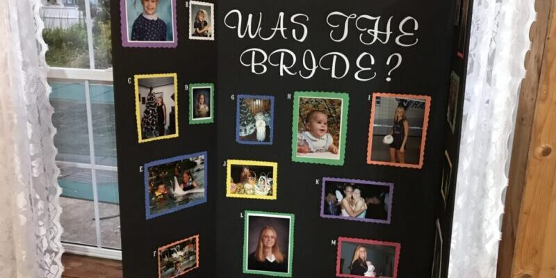 Display board with bride's childhood photos.